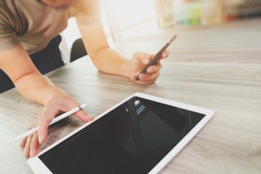 top view of Designer hand working with digital tablet computer o