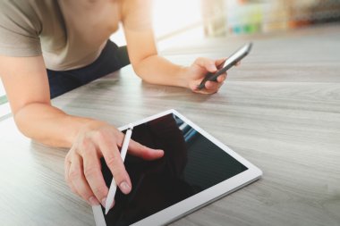 top view of Designer hand working with digital tablet computer o