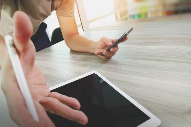 top view of Designer hand working with digital tablet computer o