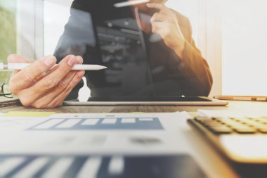 business documents on office table with laptop computer with sma