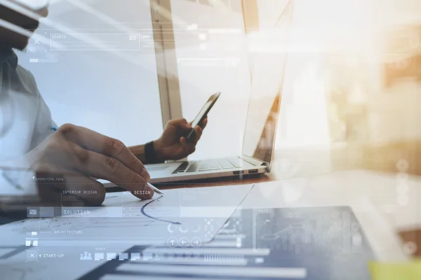 Geschäftsunterlagen auf Bürotisch mit Laptop und Grap — Stockfoto