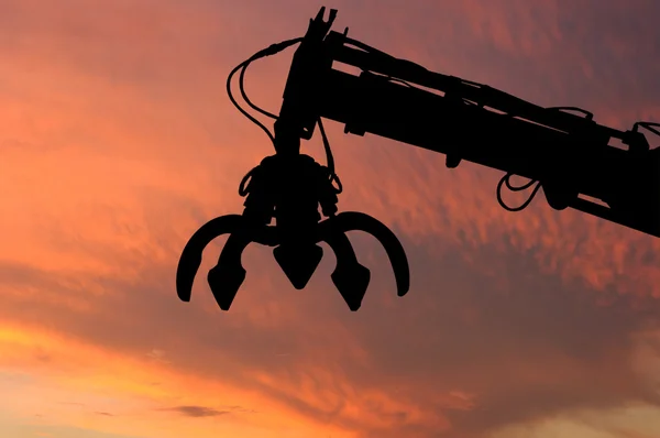 Clamshell Hydraulic Crane Shillouette Evening Light Sky — Stock Photo, Image