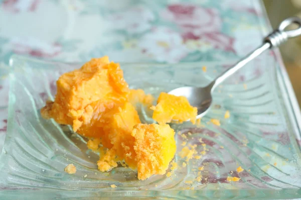 Piece of crumbs orange cake — Stock Photo, Image