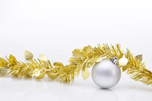 Chirstmas 's ball with golden ribbon for celebration and festiva — Stock Photo, Image