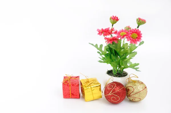 Christmas boxes flowers and balls — Stock Photo, Image