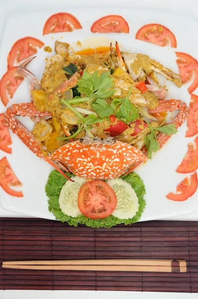 Fried crab in yellow curry on white plate — Stock Photo, Image