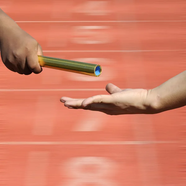 Relay-athletes hands — Stock Photo, Image