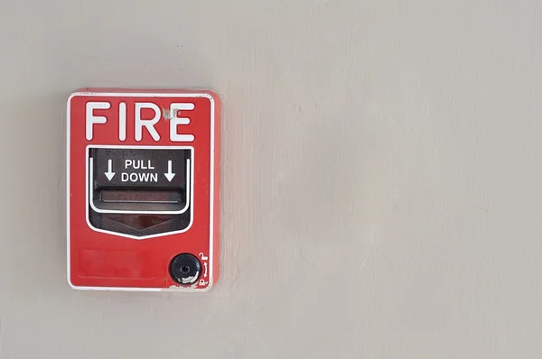 Fire alarm red box stick — Stock Photo, Image