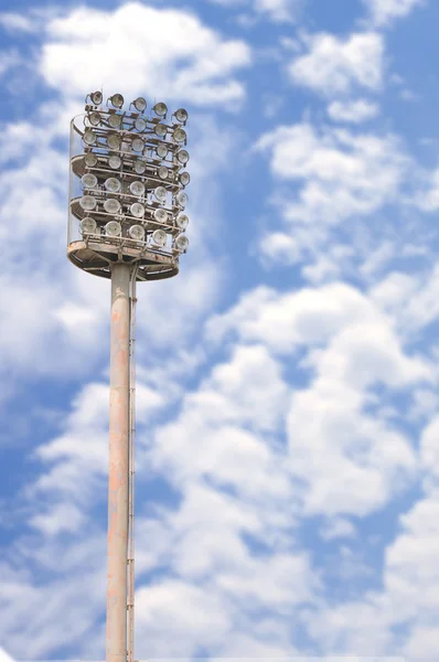 Spotlight pole with blue sky — Stock Photo, Image