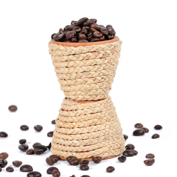Clay pot with coffee seeds — Stock Photo, Image