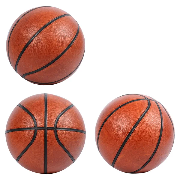 Баскетбольные мячи на белом — стоковое фото