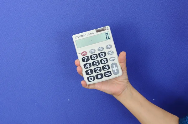 White calculator with black keypad — Stock Photo, Image