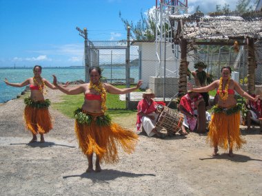 Aboriginal dancing on a tropical island clipart