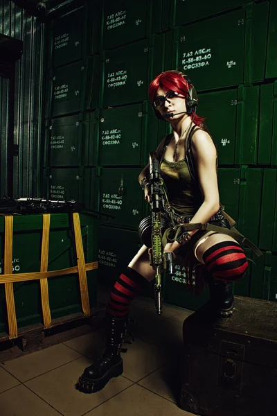 Redhead weapon girl — Stock Photo, Image