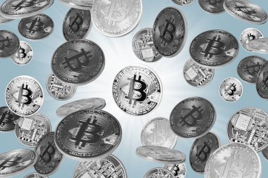 Gri arkaplan üzerine düşen bitcoinler