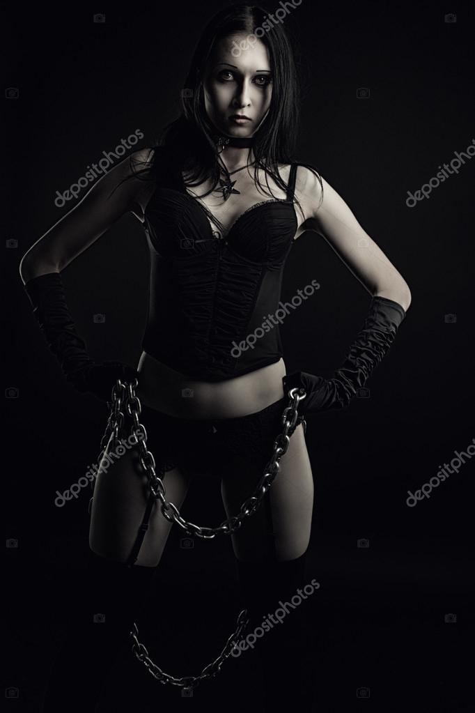 Download - Seductive girl in black lingerie with chains over dark backgroun...