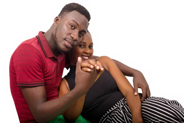 Couple Sitting White Background Embracing Looking Camera Smiling — Stock Photo, Image