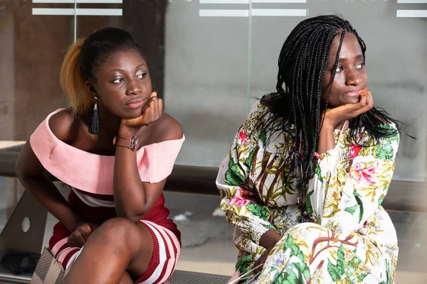 Young Women Sitting Waiting Room Looking Profile Discontent — Stock Photo, Image