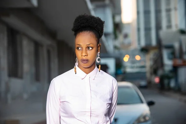 Charming Young African Woman Standing Outdoors Looking Aside — Stock Photo, Image