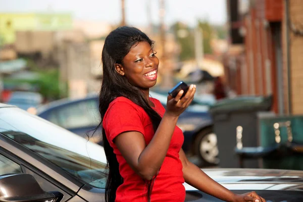 Beautiful Young African Woman Standing Outdoors Communicating Using Mobile Phone — Stock Photo, Image