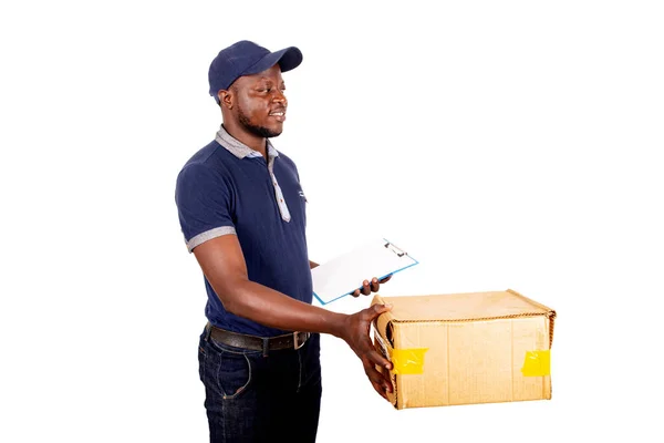 Young Delivery Man Cap Standing White Background Holding Note Pad — Stock Photo, Image