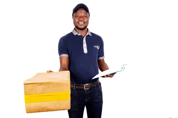 Young Delivery Man Cap Standing White Background Holding Note Pad — Stock Photo, Image