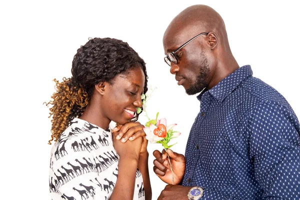 Young Man Standing White Background Offering Flower His Girlfriend While — Stock Photo, Image