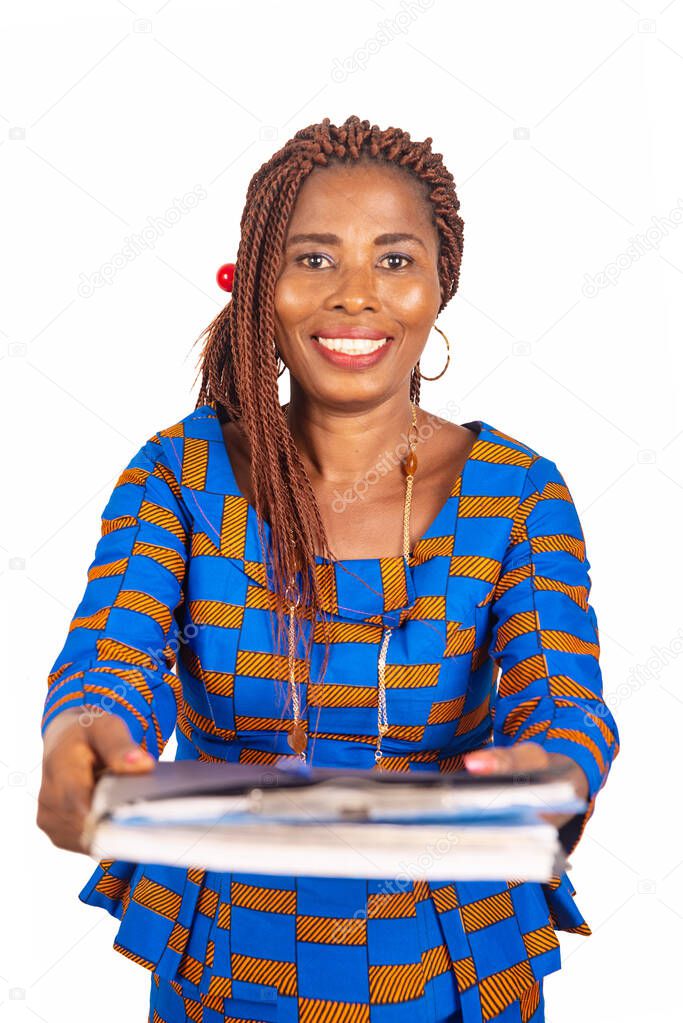 beautiful businesswoman dressed in adult traditional loincloth holding a notebook while smiling