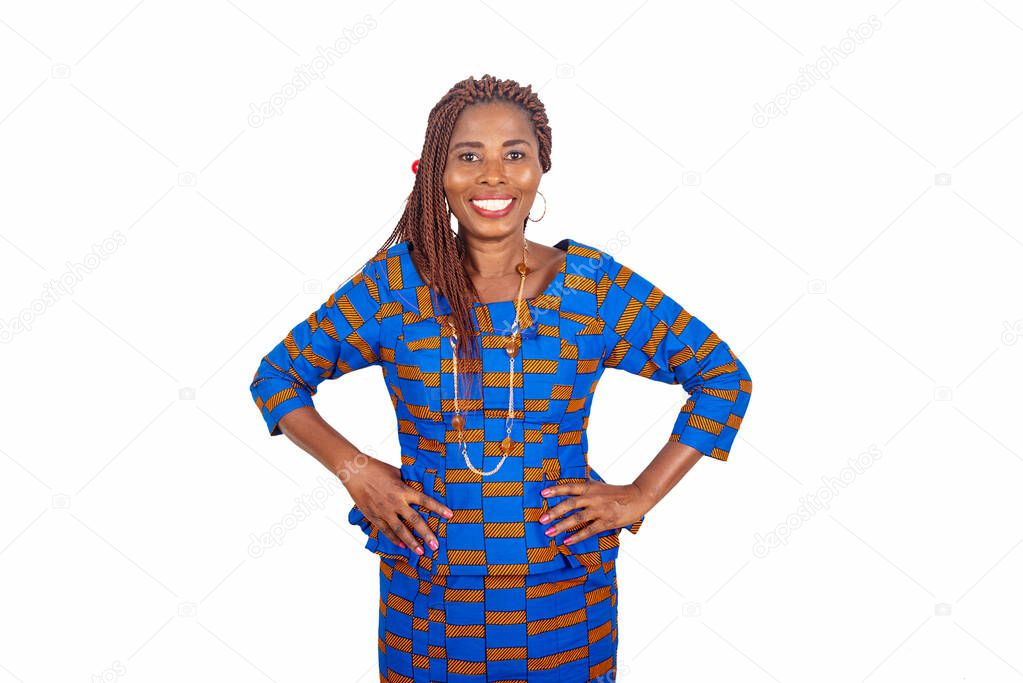 adult businesswoman wearing a traditional loincloth laying hands on her hip and looking at camera smiling