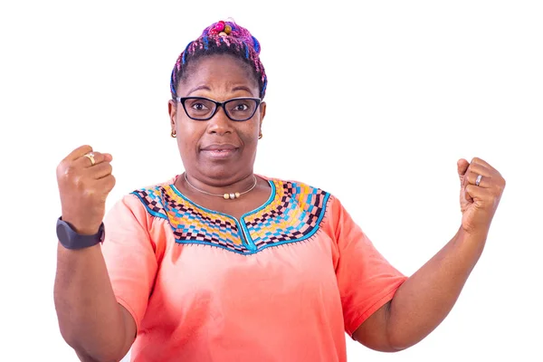 Serious Mature Woman Wearing Glasses Standing While Raising Her Fists — Stock Photo, Image