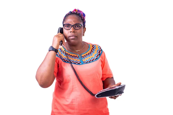Serious Mature Woman Wearing Glasses Standing While Talking Mobile Phone — Stock Photo, Image