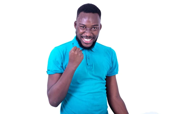 Young Happy Serious Man Wearing Blue Shirt Showing Winning Gesture — Stock Photo, Image