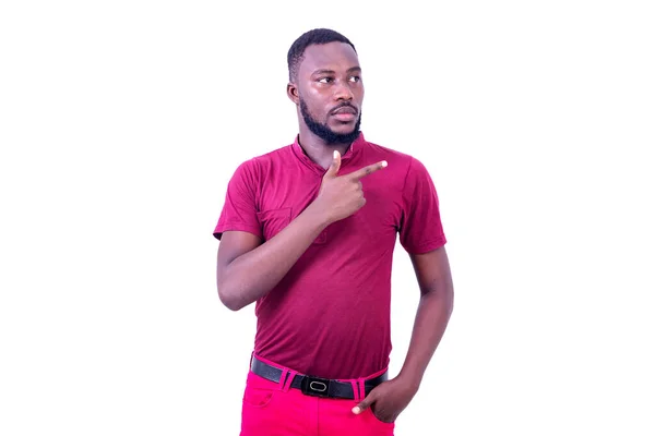 Handsome Serious Young Man Wearing Red Shirt Hand Pocket Pointing — Stock Photo, Image