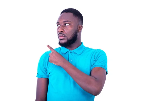 Portrait Handsome Young Serious Man Wearing Blue Shirt Pointing His — Stock Photo, Image