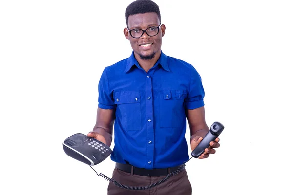 Bonito Jovem Empresário Vestindo Óculos Segurando Telefone Celular Enquanto Sorrindo — Fotografia de Stock