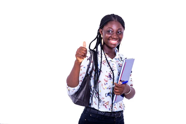 Krásná Mladá Studentka Drží Zápisník Ukazuje Palec Zatímco Usmívá Kamery — Stock fotografie
