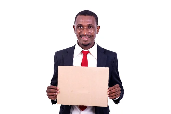 Hombre Negocios Pie Sobre Fondo Blanco Presentando Papel Vacío Mirando —  Fotos de Stock