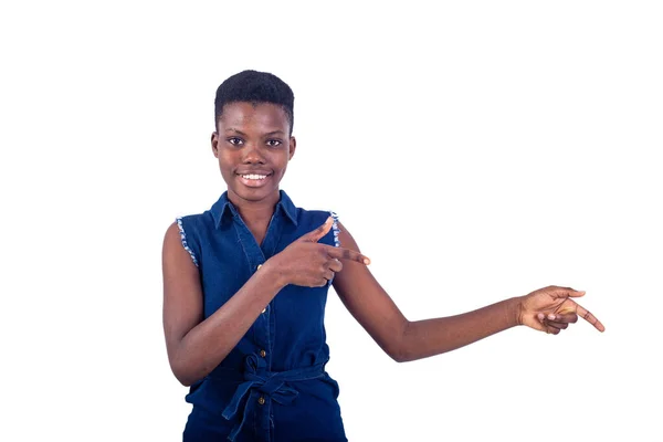 Portrait Beautiful Young Woman Pointing Fingers Aside While Smiling Camera — Stock Photo, Image