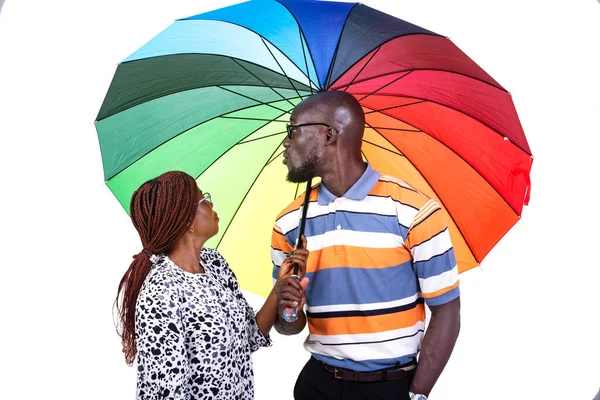 Couple Glasses Standing White Background Umbrella Looking Something — Stock Photo, Image