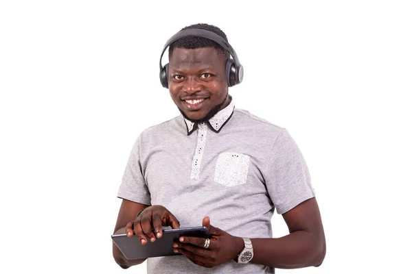 Portrait Handsome Young Man Wearing Headphones Holding Digital Tablet While — Stock Photo, Image