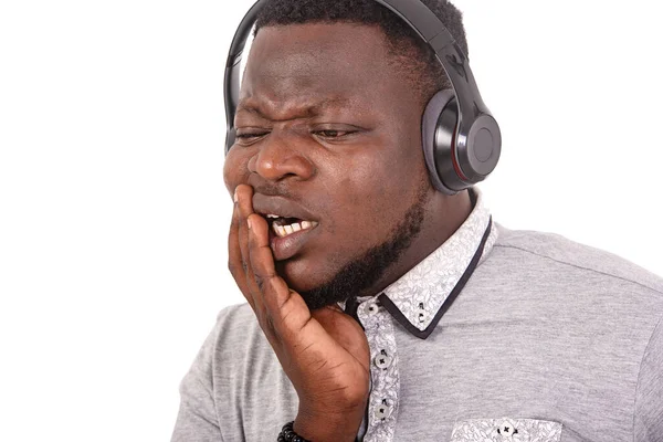 Joven Con Auriculares Agarrado Mano Mejilla Hombre Que Sufre Dolor —  Fotos de Stock