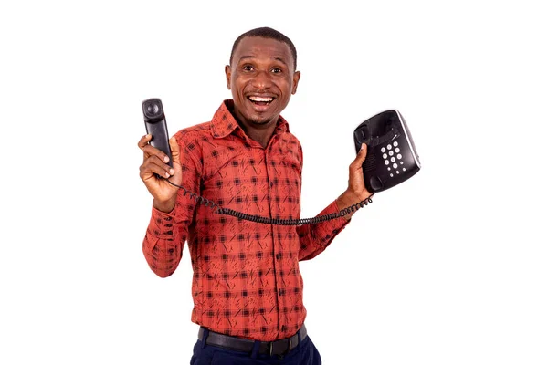 Een Knappe Zakenman Geblokt Shirt Staan Witte Achtergrond Telefoon Kijken — Stockfoto