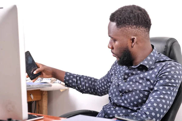Portrait Young Businessman Sitting Desk Facing Laptop Taking Photo Mobile —  Fotos de Stock