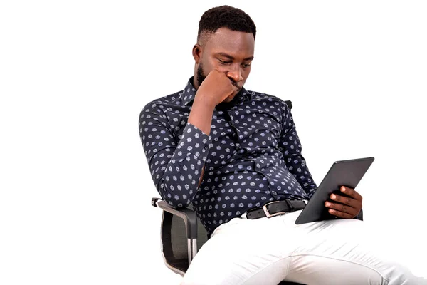 Young Bearded Man Sitting White Background Looking Tablet Angry Look —  Fotos de Stock