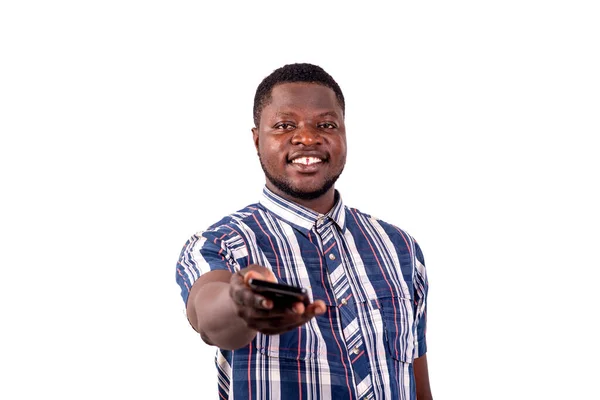 Young Man Short Sleeve Shirt Standing White Background Giving Cellphone — Stock Photo, Image