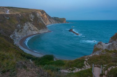 İngiltere 'deki Man O' War Beach 'in günbatımı manzarası.