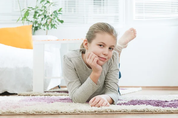 Beautiful teenager in the living room — Stock Photo, Image