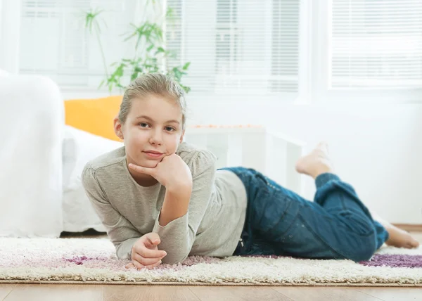 Beautiful teenager in the living room — Stock Photo, Image