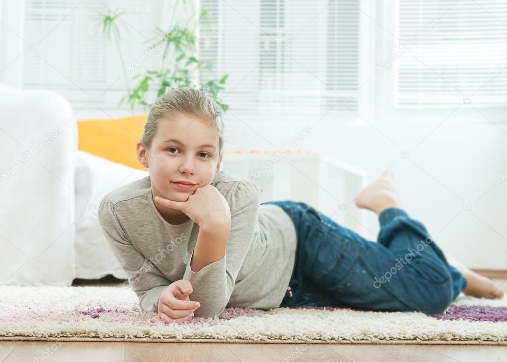 Beautiful teenager in the living room