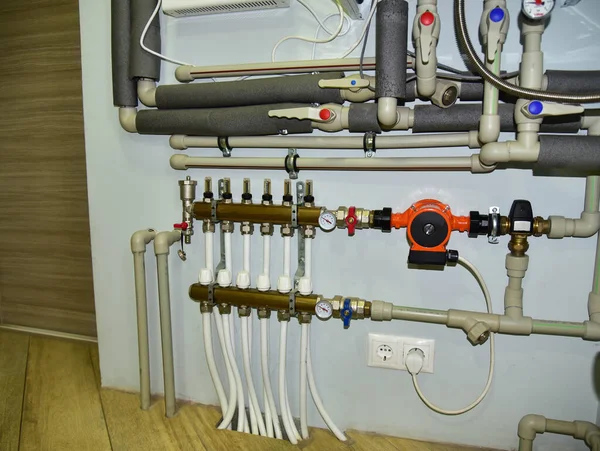 Independent heating system in boiler room at home. Domestic water supply system. Water supply for underfloor heating. Rainwater filter system. Servo, sensors and temperature control. Soft focus